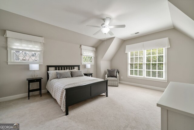 1849 Rock Springs Ln NE, Atlanta, GA 30324 - bedroom featuring multiple windows, carpet flooring, lofted ceiling, and baseboards