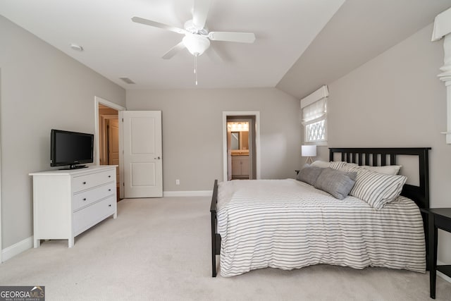 1849 Rock Springs Ln NE, Atlanta, GA 30324 - bedroom featuring light carpet, baseboards, ensuite bath, and a ceiling fan