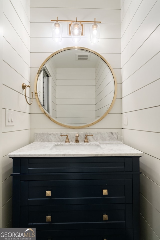 1849 Rock Springs Ln NE, Atlanta, GA 30324 - bathroom featuring vanity and wood walls