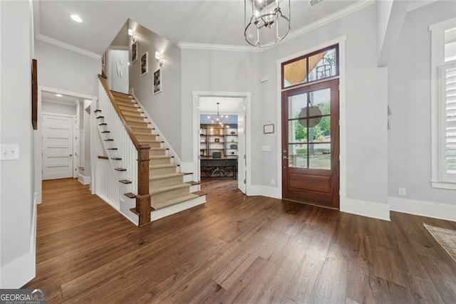116 Serenity Lake Dr, Alpharetta, GA 30004 - entrance foyer with a chandelier, wood finished floors, ornamental molding, stairway, and baseboards