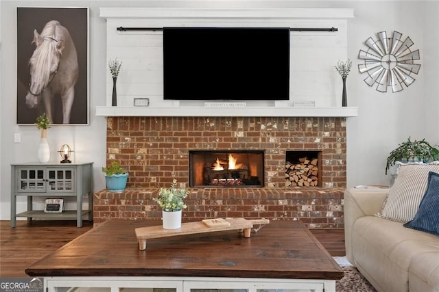 116 Serenity Lake Dr, Alpharetta, GA 30004 - living area with wood finished floors and a brick fireplace