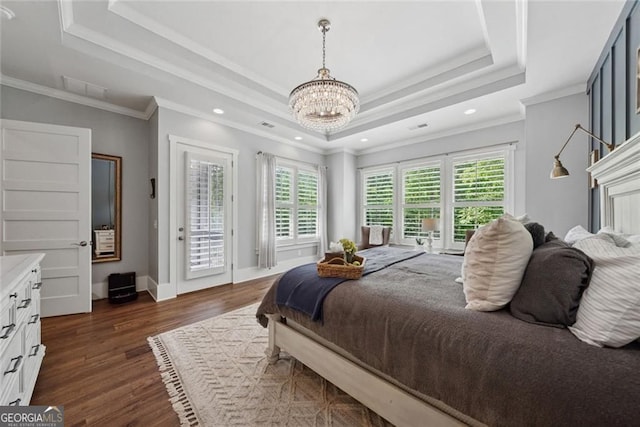 116 Serenity Lake Dr, Alpharetta, GA 30004 - bedroom featuring a raised ceiling, access to exterior, a chandelier, dark wood-type flooring, and crown molding