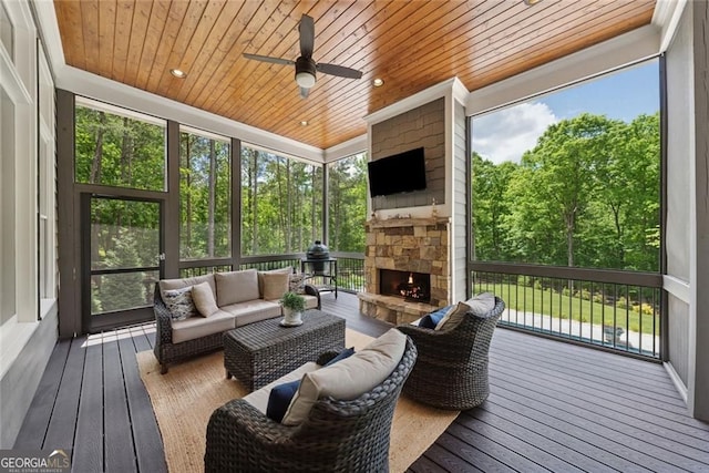 116 Serenity Lake Dr, Alpharetta, GA 30004 - sunroom featuring ceiling fan and an outdoor living space with a fireplace