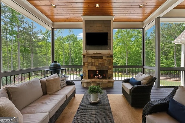 116 Serenity Lake Dr, Alpharetta, GA 30004 - sunroom with an outdoor living space with a fireplace