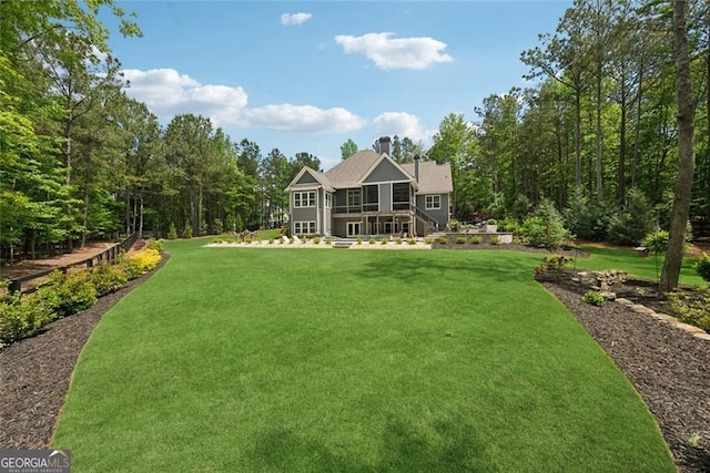 116 Serenity Lake Dr, Alpharetta, GA 30004 - view of green lawn featuring a sunroom and a view of trees