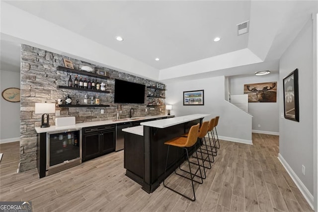 116 Serenity Lake Dr, Alpharetta, GA 30004 - indoor wet bar featuring beverage cooler, light wood-type flooring, dishwasher, baseboards, and recessed lighting