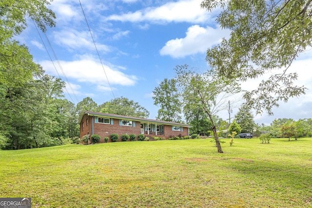 5255 Post Rd, Winston, GA 30187 - ranch-style home featuring a front lawn and brick siding