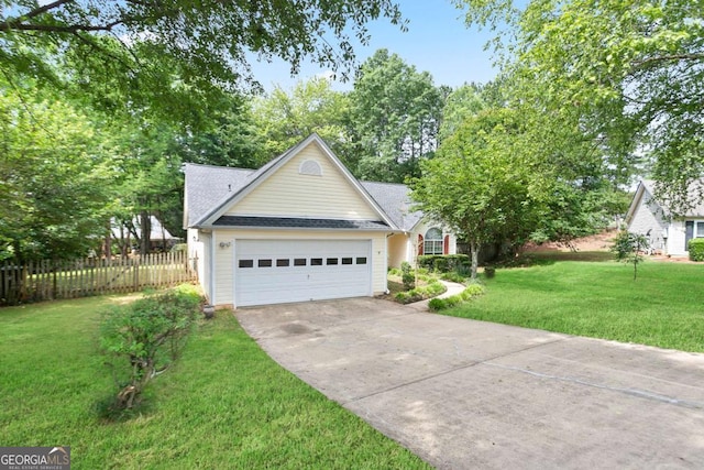 174 Saint Georges Ct, Suwanee, GA 30024 - view of front facade featuring driveway, an attached garage, and a shingled roof