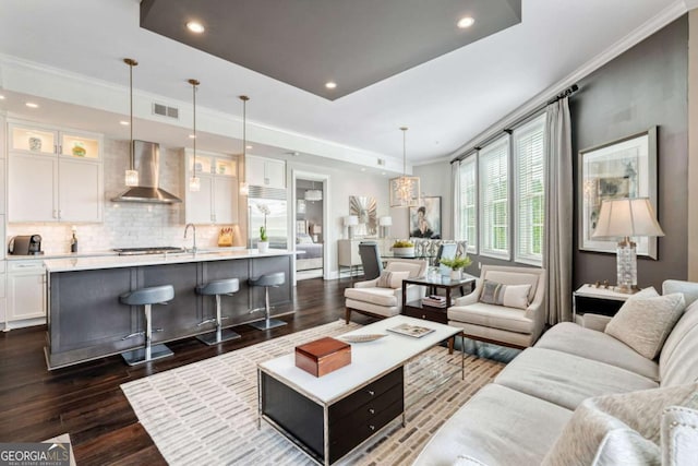 58 Canton St Unit 404, Alpharetta, GA 30009 - living room featuring dark wood-style flooring, recessed lighting, and crown molding