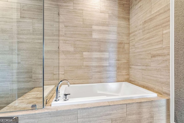 full bathroom featuring a bath
