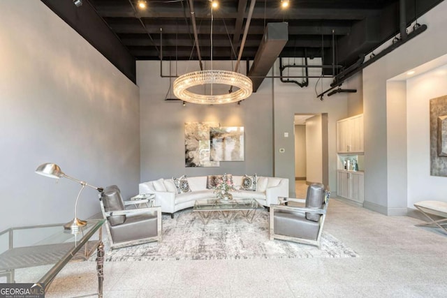 58 Canton St Unit 404, Alpharetta, GA 30009 - kitchen featuring dark wood-style flooring, white cabinets, light countertops, a kitchen island with sink, and high end stainless steel range oven