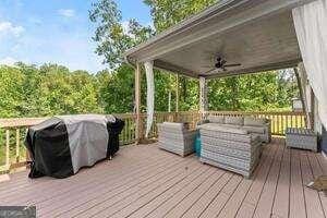 3616 Castoff Ct, Gainesville, GA 30506 - deck featuring an outdoor living space, a ceiling fan, and a grill