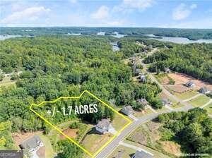 3616 Castoff Ct, Gainesville, GA 30506 - aerial overview of property's location with property boundaries highlighted and a forest