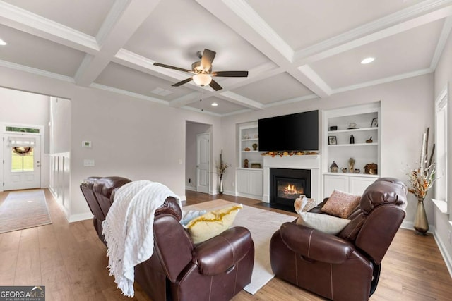 3616 Castoff Ct, Gainesville, GA 30506 - living area featuring coffered ceiling, wood finished floors, beamed ceiling, a ceiling fan, and a fireplace with flush hearth