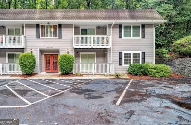 3142 Reeves St SE, Smyrna, GA 30080 - view of building exterior featuring uncovered parking