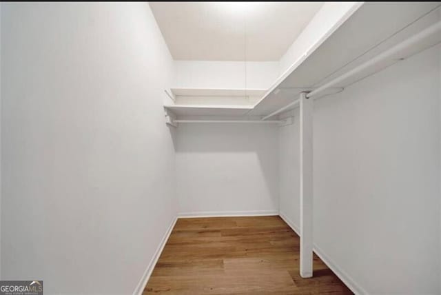 3142 Reeves St SE, Smyrna, GA 30080 - spacious closet with wood finished floors