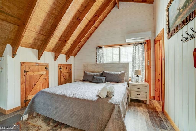 369 Trillium Rd, Suches, GA 30572 - bedroom featuring a wall mounted air conditioner, wood finished floors, wood walls, wood ceiling, and baseboards