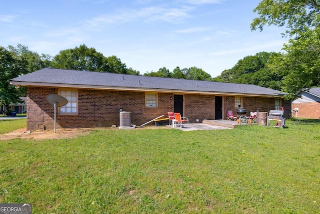 19 Hannon Way, Cartersville, GA 30120 - back of property with a patio area, a yard, and brick siding