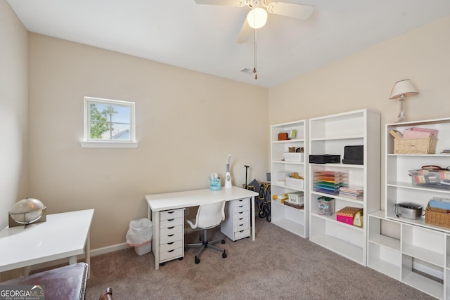 carpeted office with ceiling fan