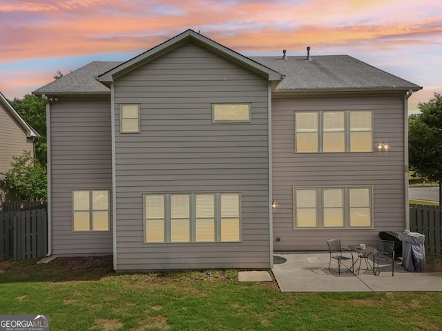 back of property with a patio area