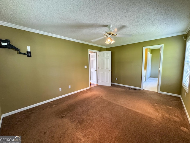 unfurnished bedroom featuring crown molding, a textured ceiling, carpet, baseboards, and ceiling fan