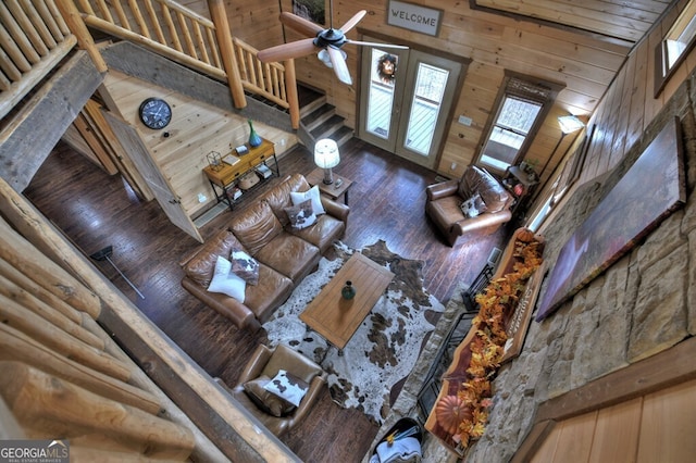 840 Deer Crest Rd, Blue Ridge, GA 30513 - living room featuring wood-type flooring, wooden walls, and ceiling fan