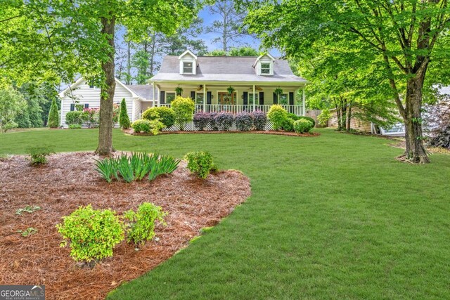 1870 Shoreline Trce, Grayson, GA 30017 - new england style home with a porch, a front lawn, and ceiling fan