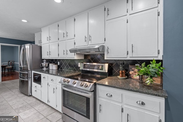 1870 Shoreline Trce, Grayson, GA 30017 - kitchen featuring stainless steel appliances, under cabinet range hood, white cabinets, backsplash, and recessed lighting
