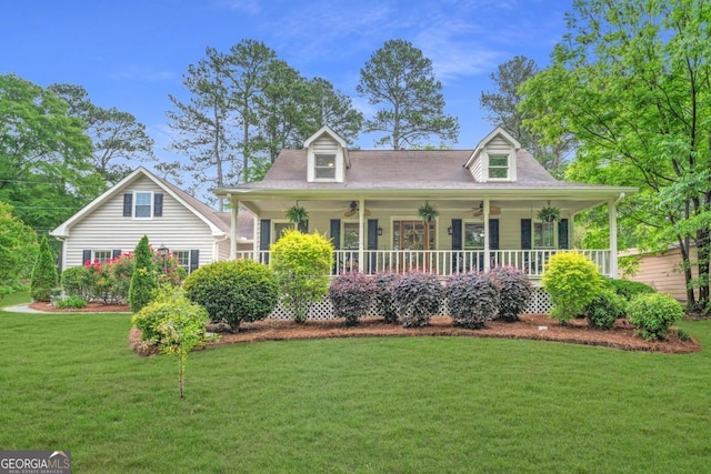 1870 Shoreline Trce, Grayson, GA 30017 - cape cod-style house featuring a ceiling fan, a front lawn, and a porch