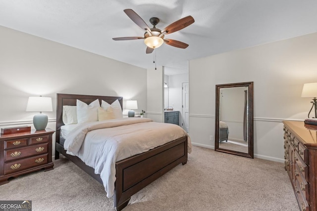 1870 Shoreline Trce, Grayson, GA 30017 - bedroom with light colored carpet, ensuite bath, and a ceiling fan