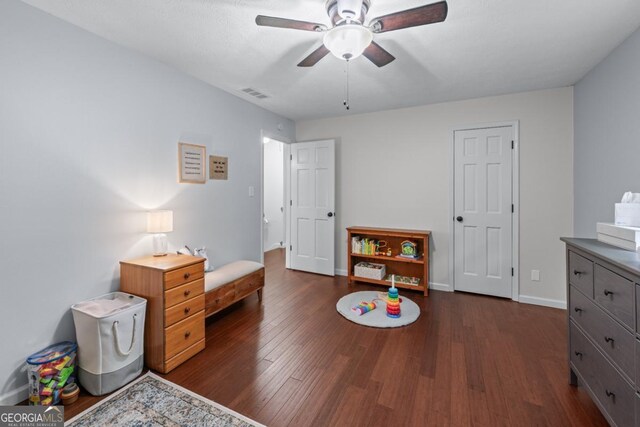 1870 Shoreline Trce, Grayson, GA 30017 - bedroom featuring dark wood-style floors, baseboards, and ceiling fan