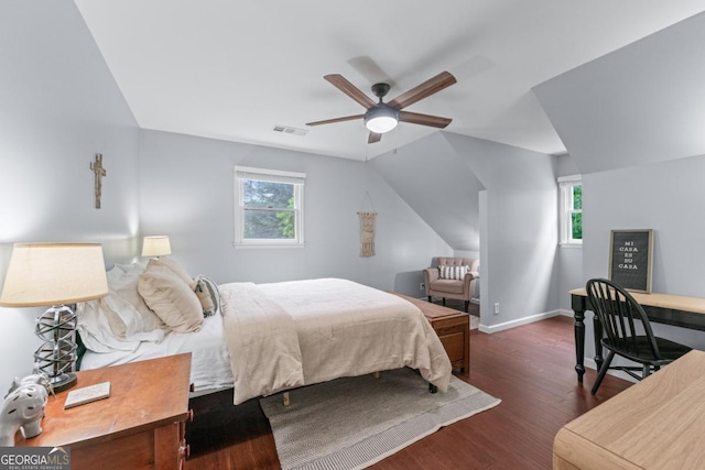 1870 Shoreline Trce, Grayson, GA 30017 - bedroom with dark wood finished floors, multiple windows, vaulted ceiling, baseboards, and a ceiling fan