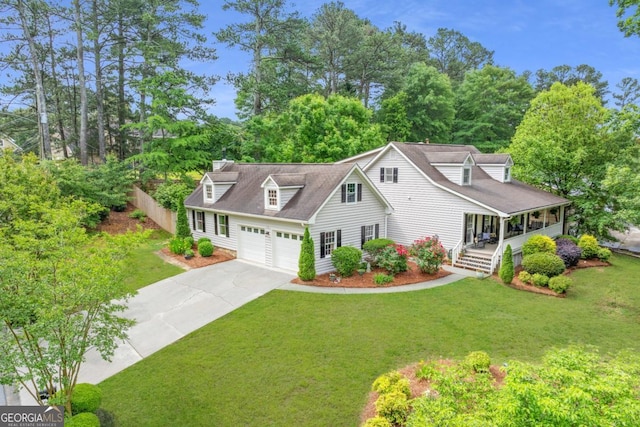 1870 Shoreline Trce, Grayson, GA 30017 - cape cod home with covered porch, concrete driveway, and a front yard