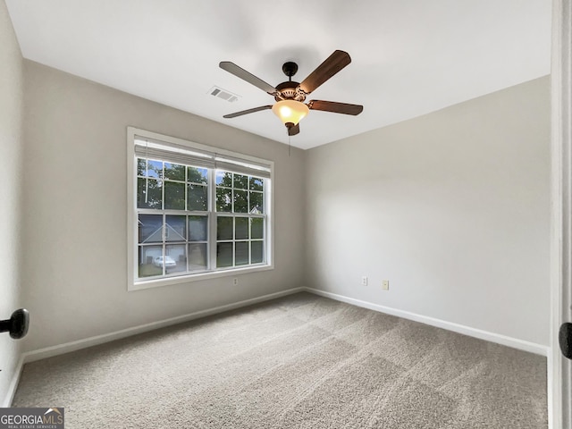 617 Kyles Cir, Hiram, GA 30141 - spare room featuring baseboards, ceiling fan, and carpet floors