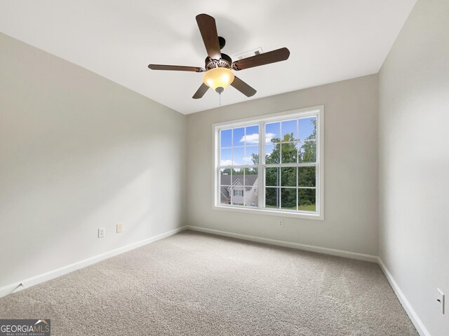 617 Kyles Cir, Hiram, GA 30141 - empty room with carpet flooring, baseboards, and a ceiling fan