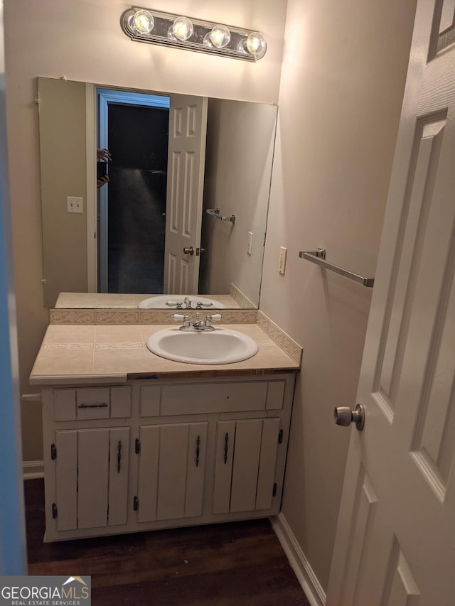 135 Beverly Park Ct, Newnan, GA 30263 - bathroom with wood finished floors and vanity