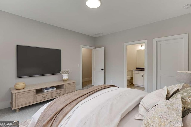 7620 Breeze Bay Rd, Cumming, GA 30041 - bedroom with ensuite bath and light carpet