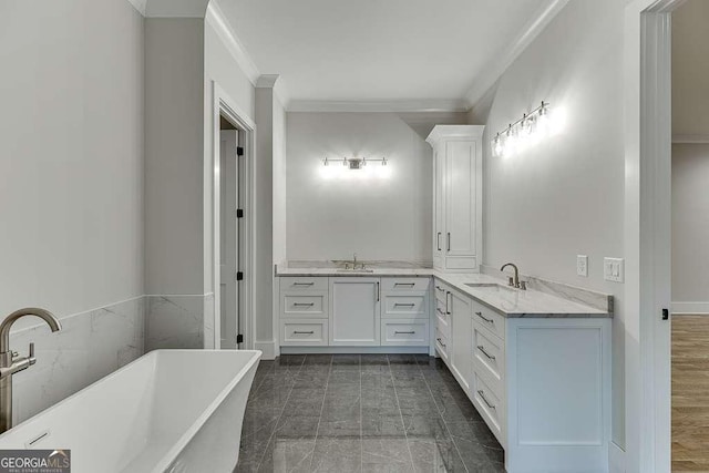 7620 Breeze Bay Rd, Cumming, GA 30041 - bathroom with crown molding, vanity, and a freestanding tub