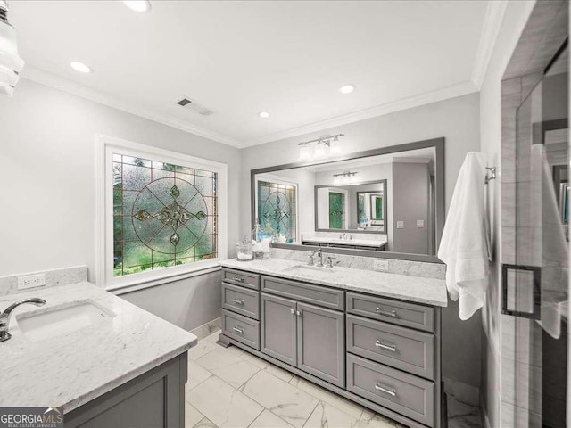 bathroom featuring marble look tiles, two vanities, recessed lighting, ornamental molding, and baseboards