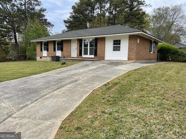 6927 Eunice Dr, Riverdale, GA 30274 - ranch-style home with brick siding, concrete driveway, and a front lawn