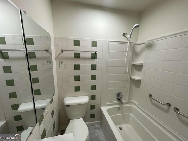 6927 Eunice Dr, Riverdale, GA 30274 - bathroom with tile walls, toilet, and  shower combination