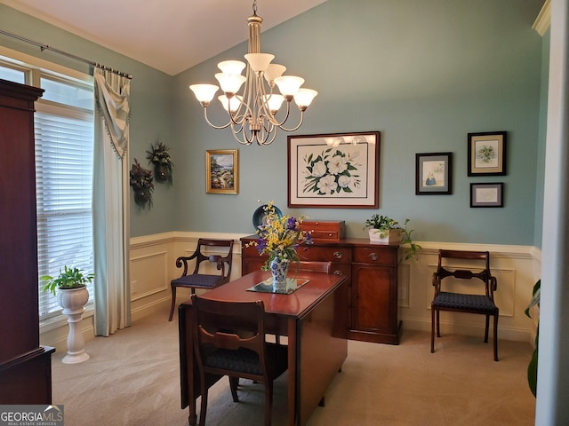 106 Hamway Ln, Winder, GA 30680 - dining area featuring light carpet, healthy amount of natural light, a chandelier, a wainscoted wall, and vaulted ceiling