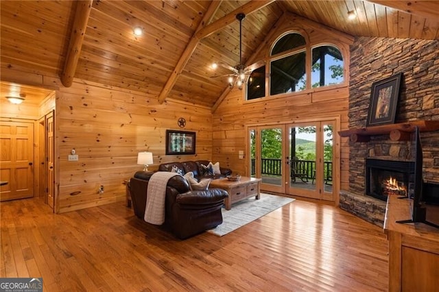 512 Picklesimer Mtn Rd, Morganton, GA 30560 - living room featuring wood-type flooring, ceiling fan, a fireplace, high vaulted ceiling, and beamed ceiling