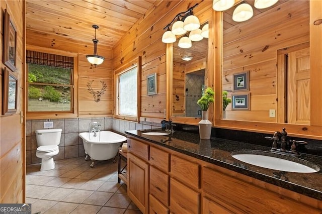 512 Picklesimer Mtn Rd, Morganton, GA 30560 - full bath with tile patterned flooring, a freestanding tub, double vanity, wooden ceiling, and wood walls