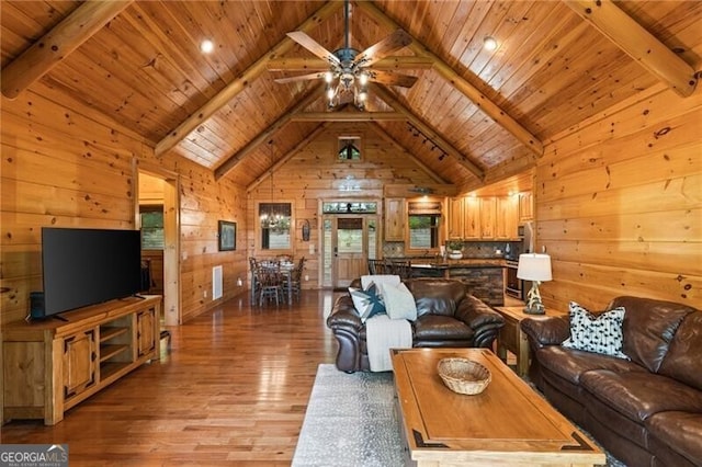512 Picklesimer Mtn Rd, Morganton, GA 30560 - living room featuring wooden ceiling, light wood-style flooring, wooden walls, and ceiling fan