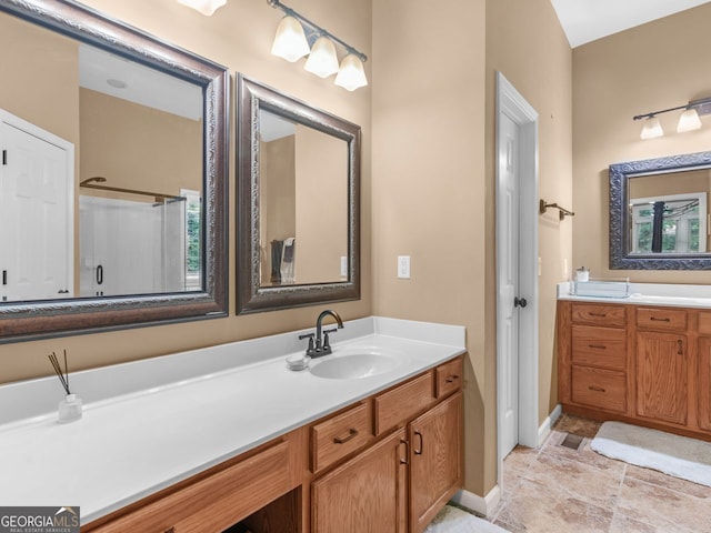 361 Brackin Trce, Grayson, GA 30017 - full bathroom featuring vanity, a shower with door, and baseboards
