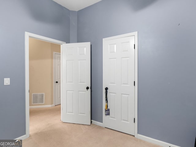 361 Brackin Trce, Grayson, GA 30017 - unfurnished bedroom featuring light carpet and baseboards