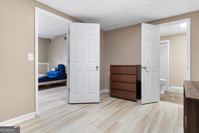 10 Piedmont Ln, Cartersville, GA 30120 - bedroom with a paneled ceiling, light wood-type flooring, and baseboards