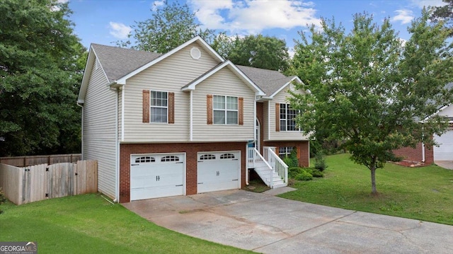 10 Piedmont Ln, Cartersville, GA 30120 - view of front of house featuring driveway, a garage, brick siding, roof with shingles, and stairway