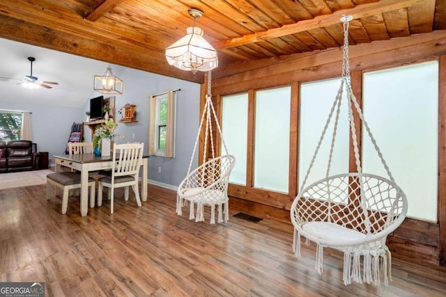 115 S Meadowcliff Cir, Carrollton, GA 30116 - dining room featuring wood finished floors, wooden ceiling, a ceiling fan, baseboards, and a chandelier